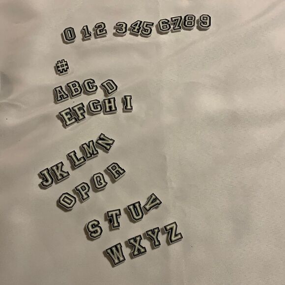 37 piece shoe charms. New and only opened for photos - Picture 1 of 3